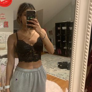 Corset-type top with floral designs. Never worn except to model.